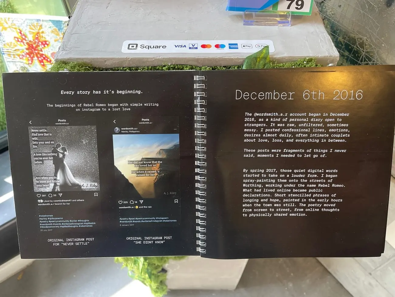 Open spiral-bound archive book showing the original Instagram posts for Never Settle and She Did Not Know, beside a page titled December 6th 2016